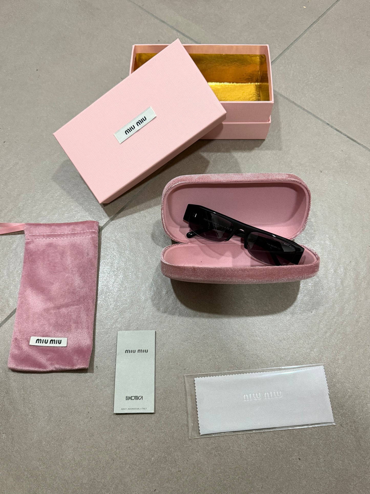 OCCHIALI DA SOLE MIU MIU