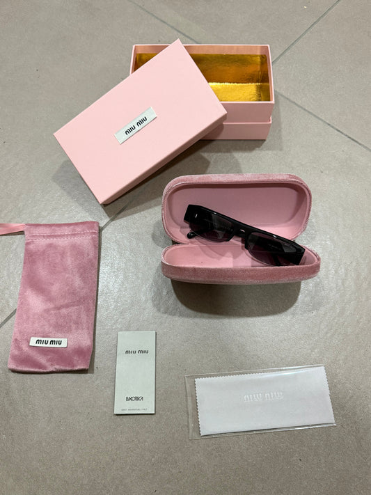 OCCHIALI DA SOLE MIU MIU